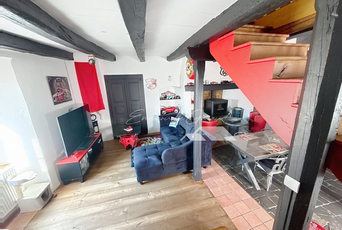 Maison de village à Paulhe avec grand garage, rénovation récente et authenticité assurée 