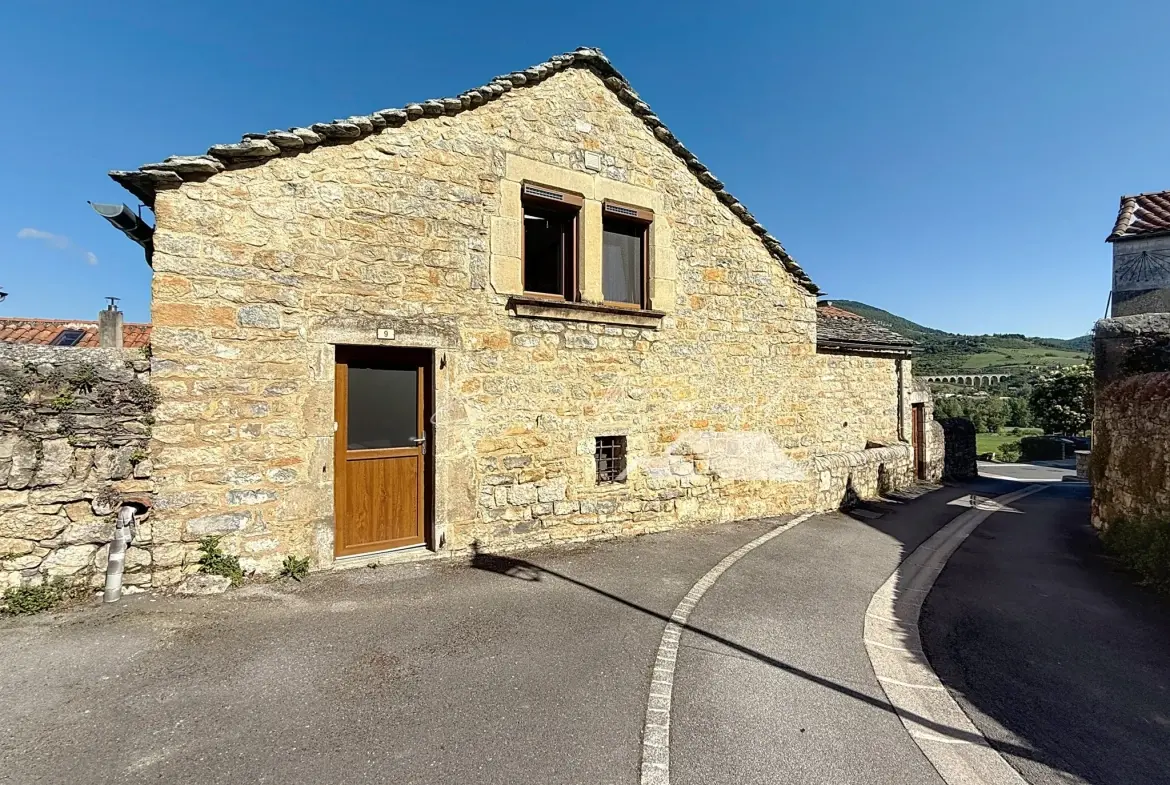 Maison de village à Paulhe avec grand garage, rénovation récente et authenticité assurée 