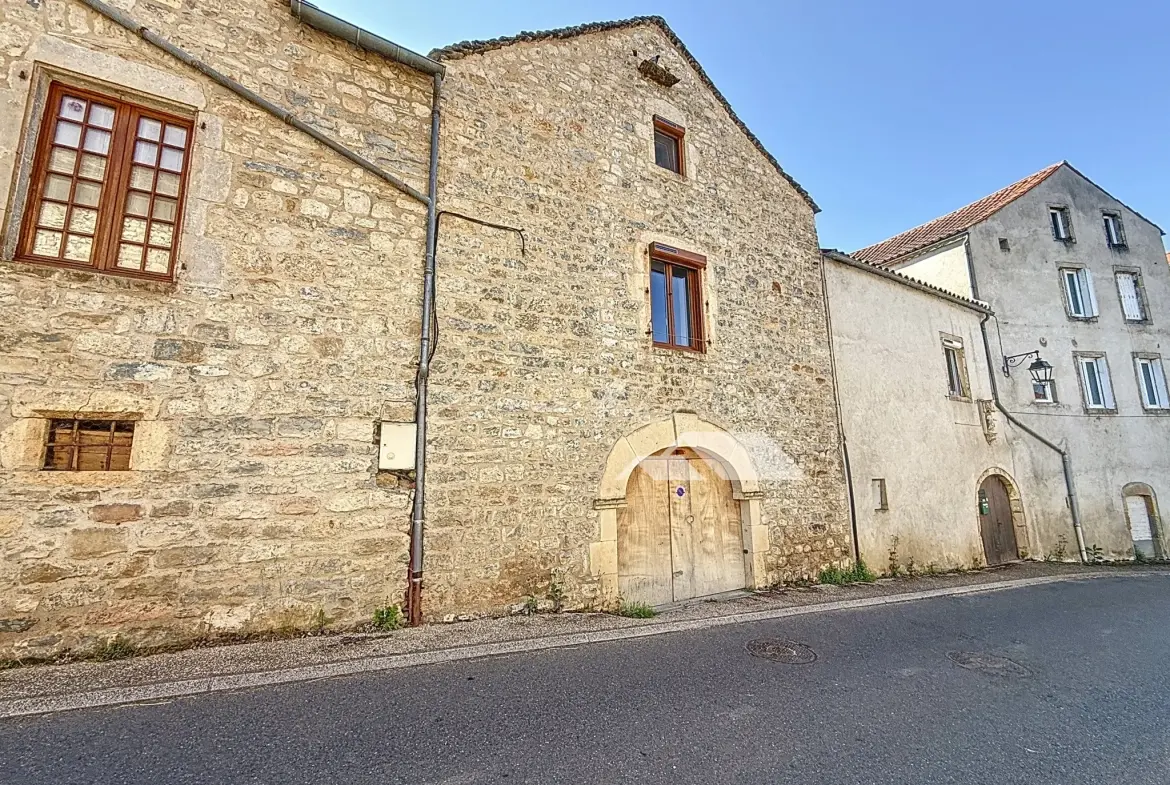 Maison de village à Paulhe avec grand garage, rénovation récente et authenticité assurée 