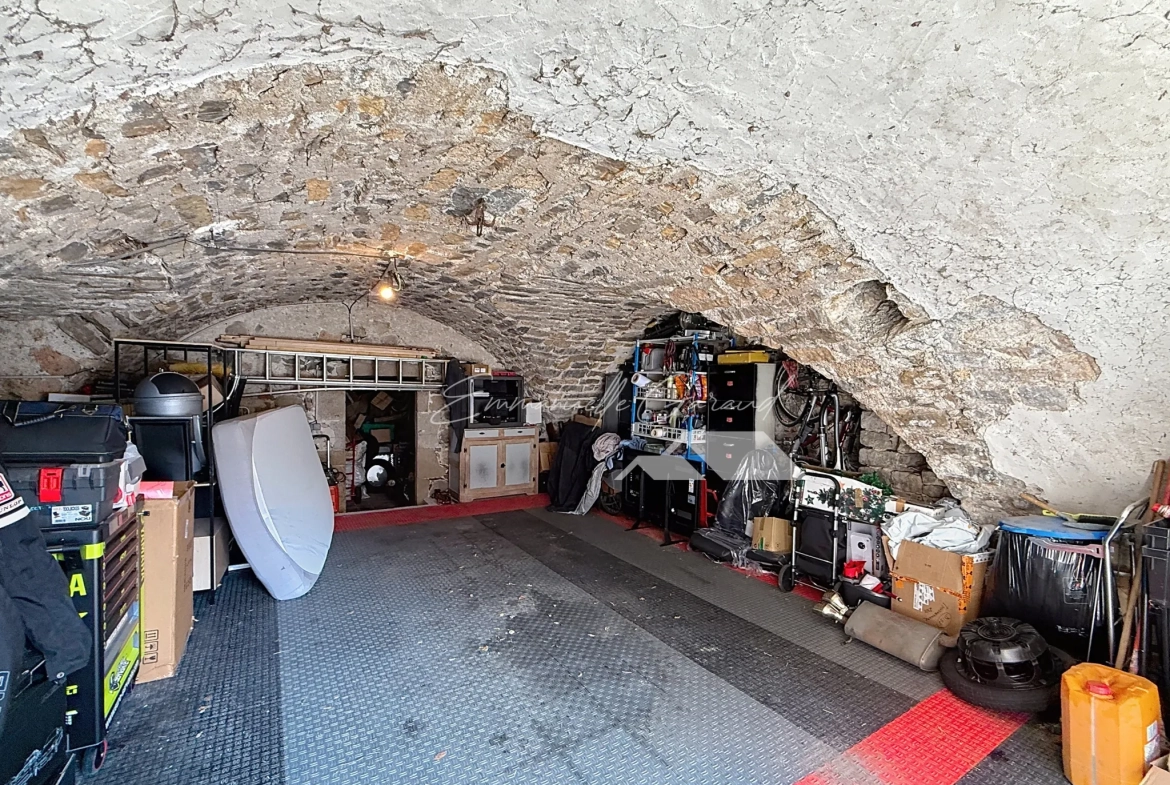 Maison de village à Paulhe avec grand garage, rénovation récente et authenticité assurée 