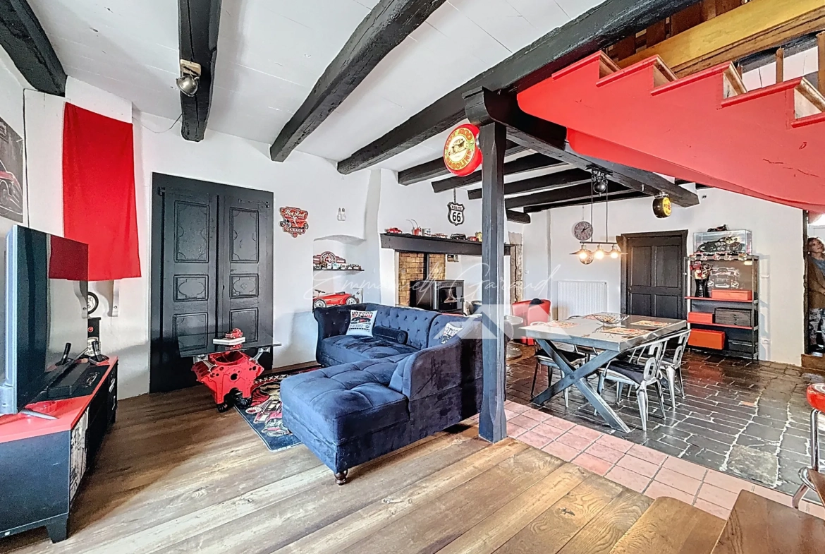 Maison de village à Paulhe avec grand garage, rénovation récente et authenticité assurée 