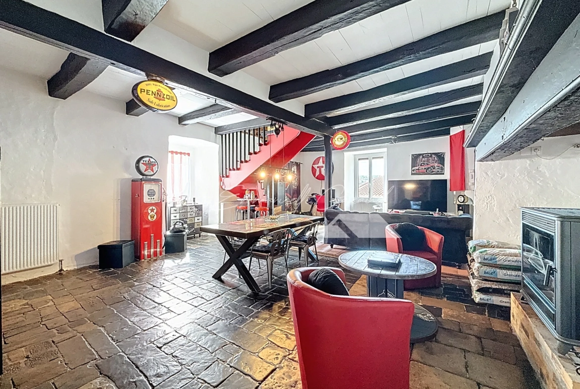 Maison de village à Paulhe avec grand garage, rénovation récente et authenticité assurée 