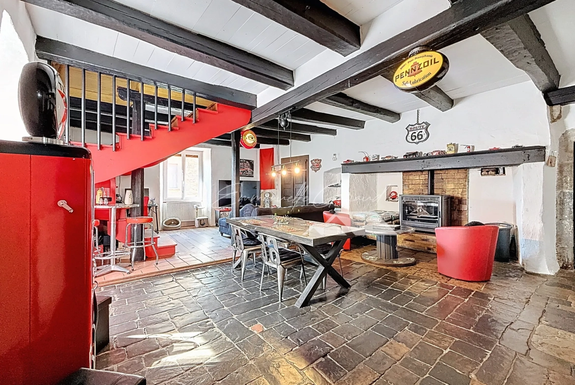 Maison de village à Paulhe avec grand garage, rénovation récente et authenticité assurée 