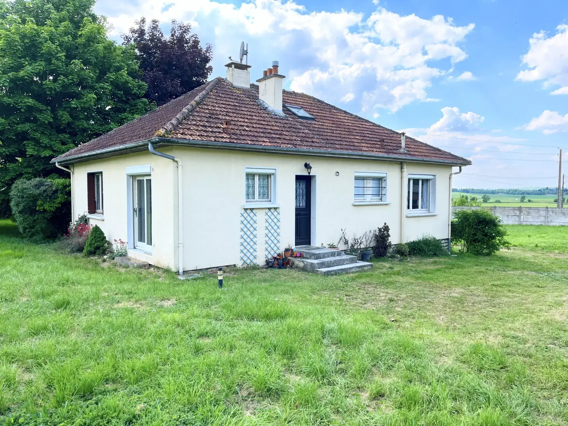 Maison de plain-pied avec jardin clos et garage à La Ferté-Gaucher 