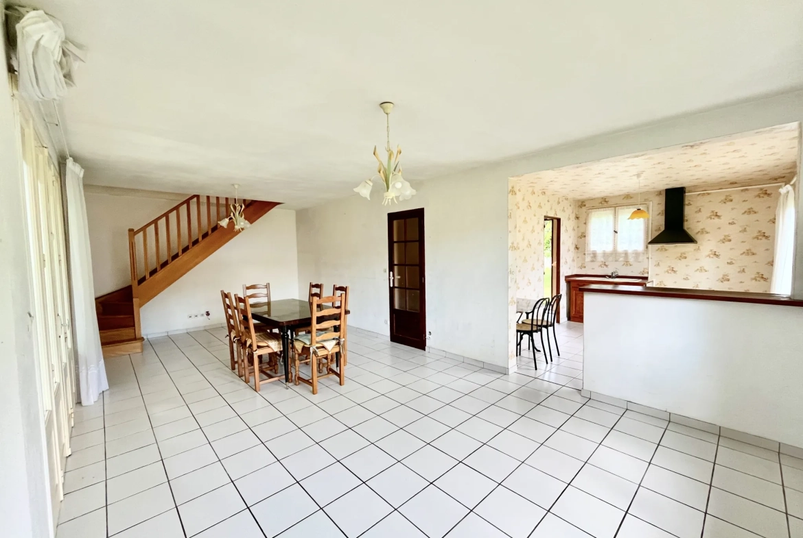 Maison de plain-pied avec jardin clos et garage à La Ferté-Gaucher 
