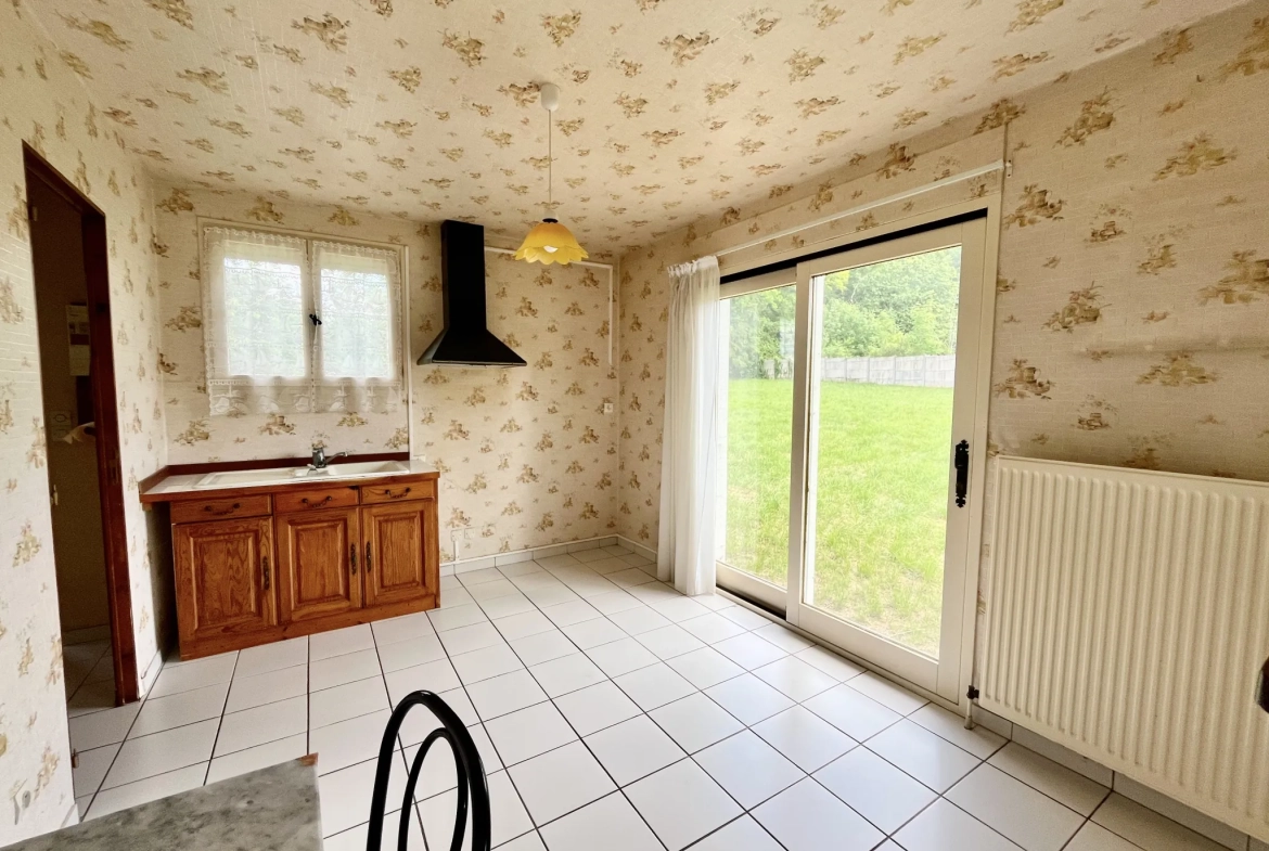 Maison de plain-pied avec jardin clos et garage à La Ferté-Gaucher 