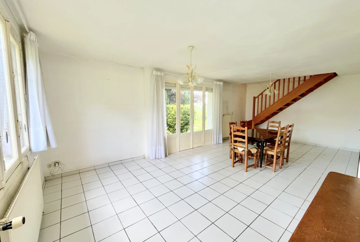 Maison de plain-pied avec jardin clos et garage à La Ferté-Gaucher 