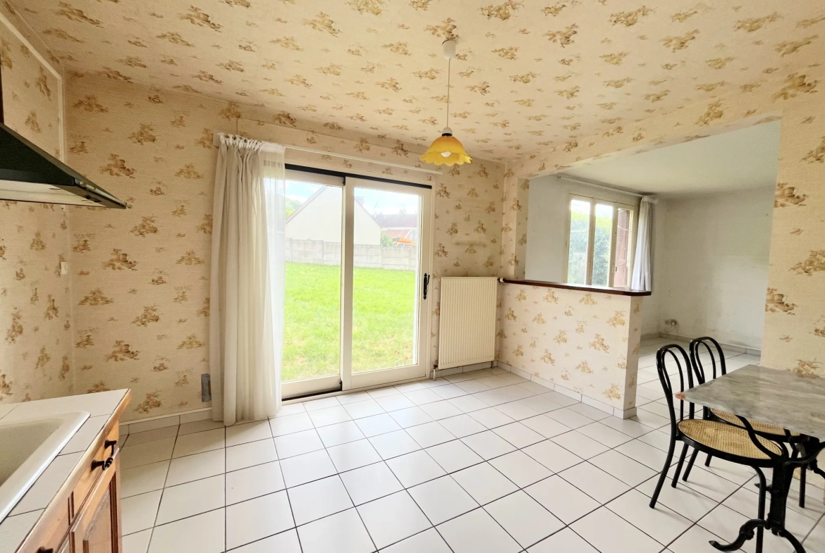 Maison de plain-pied avec jardin clos et garage à La Ferté-Gaucher 