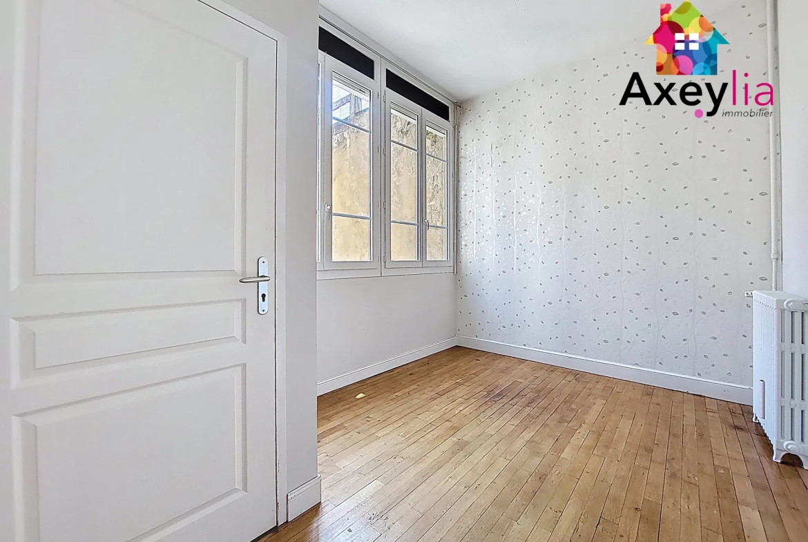 A vendre appartement T5 rénové dans le centre de Roanne - Charme haussmannien 