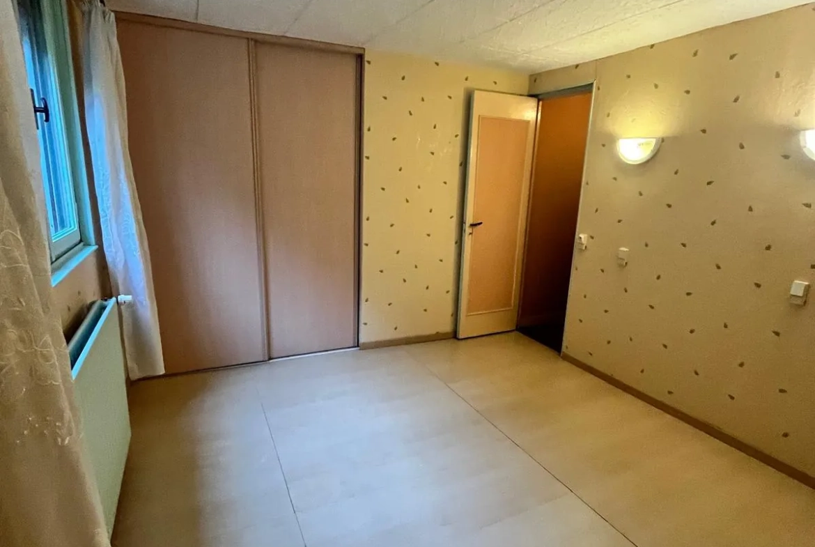 Maison à rénover à Guise - 2 chambres, jardin, prix attractif 