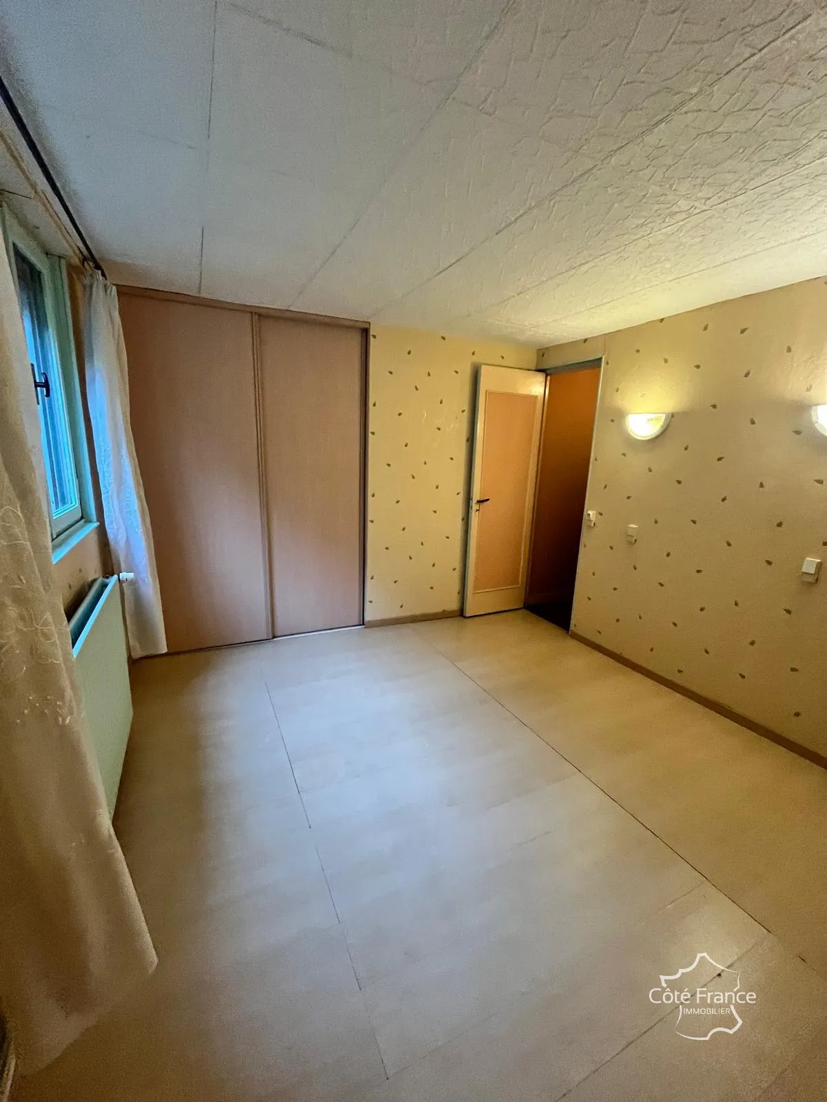 Maison à rénover à Guise - 2 chambres, jardin, prix attractif 