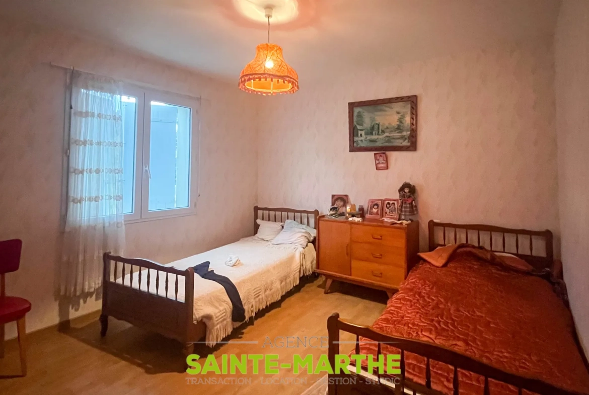 Vente d'un pavillon de plain-pied à Niort avec 3 chambres, garage et jardin 