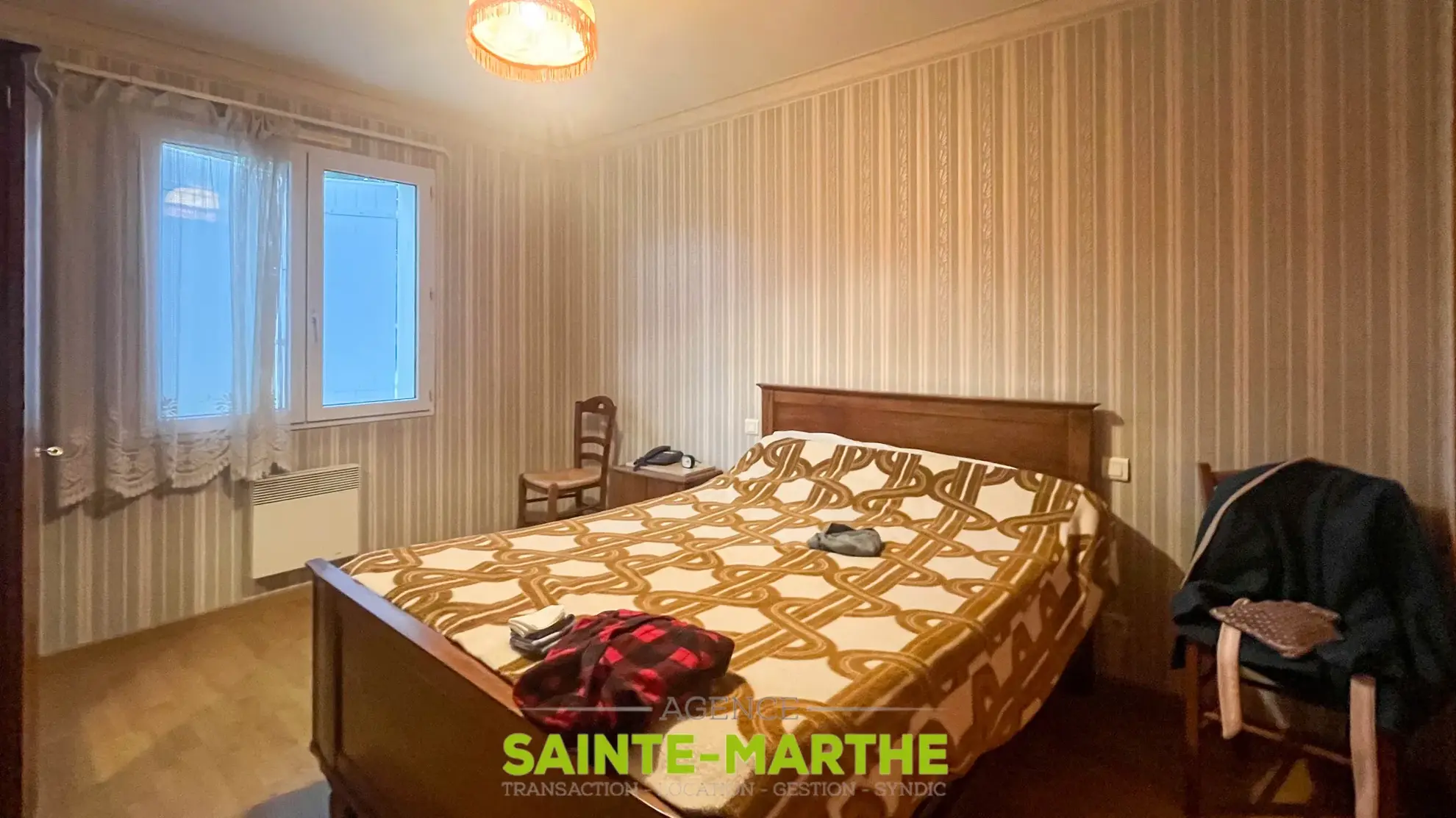 Vente d'un pavillon de plain-pied à Niort avec 3 chambres, garage et jardin 