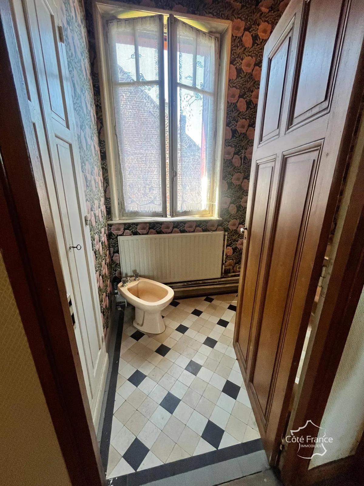 À vendre maison de ville à Guise, 98.9 m² à rénover, garage et cour privée 