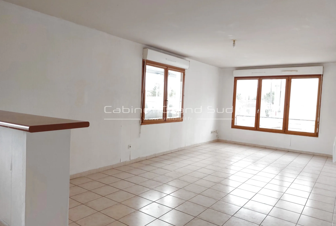 Appartement de 3 pièces avec loggia et garage à Lunel - 63 m² 