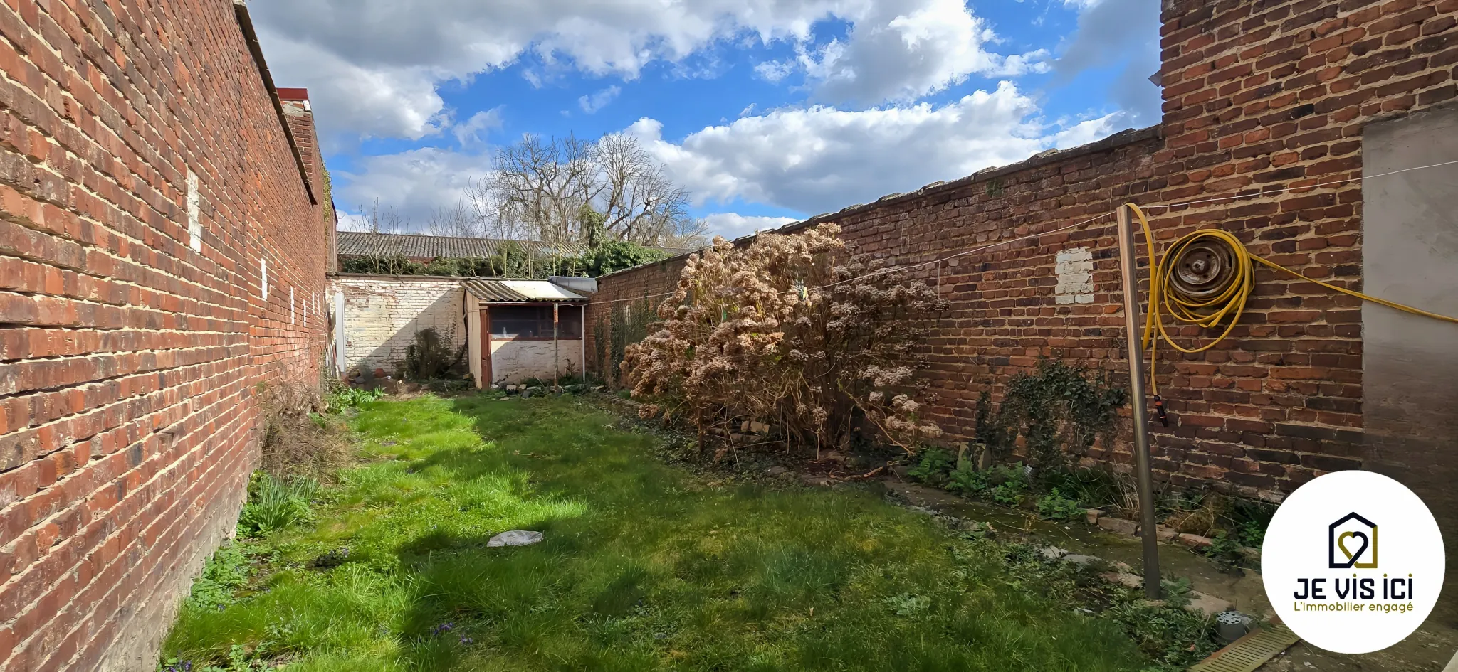 Maison des années 30 avec jardin à La Bassée - Charme et potentiel à saisir 