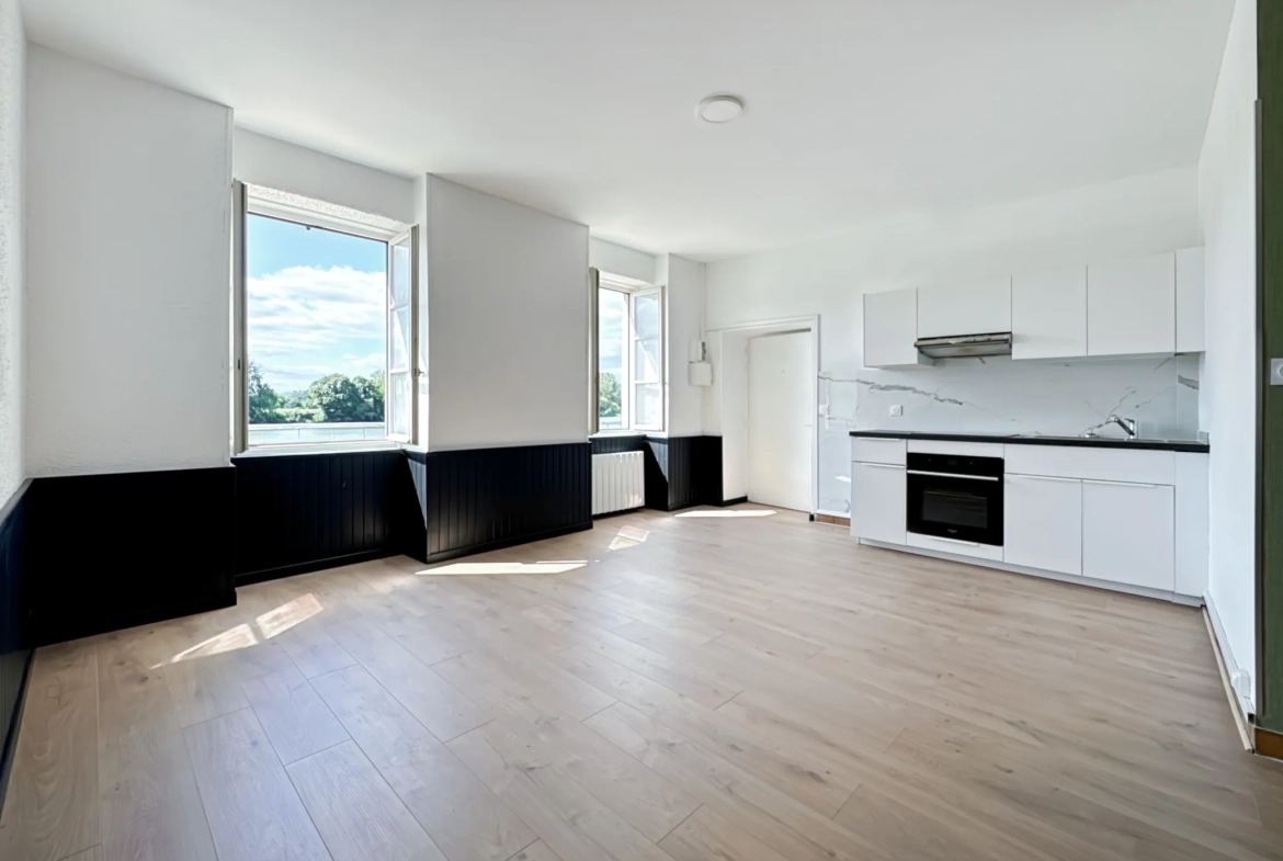 Studio à vendre à Trévoux avec vue sur la Saône - Opportunité immobilière 