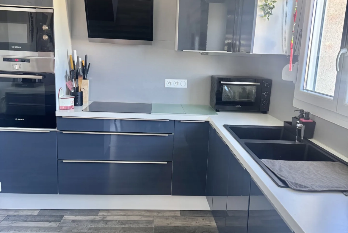 À vendre duplex à Bavilliers de 4 chambres avec terrasse et garage - secteur calme 