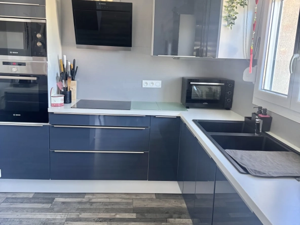 À vendre duplex à Bavilliers de 4 chambres avec terrasse et garage - secteur calme