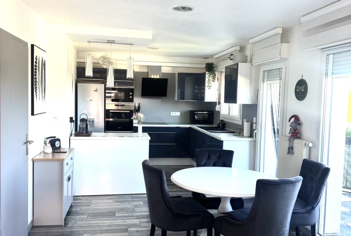 À vendre duplex à Bavilliers de 4 chambres avec terrasse et garage - secteur calme 