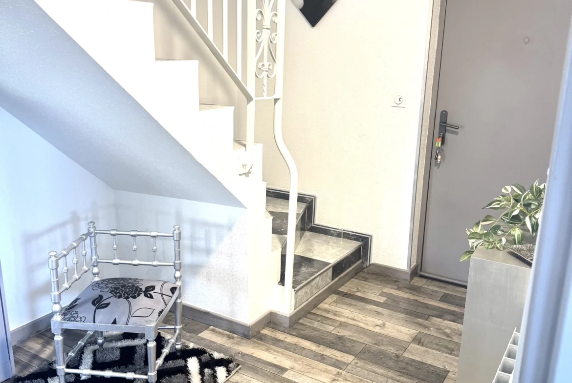 À vendre duplex à Bavilliers de 4 chambres avec terrasse et garage - secteur calme 