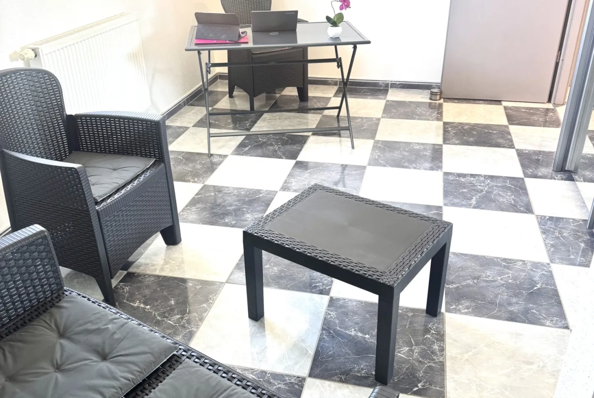 À vendre duplex à Bavilliers de 4 chambres avec terrasse et garage - secteur calme 