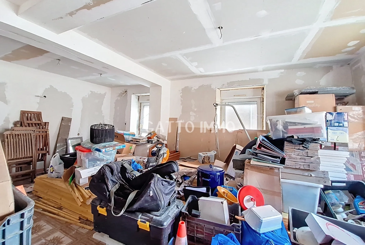 Maison à rénover de 136 m² au centre de Boulay - Potentiel d'investissement 