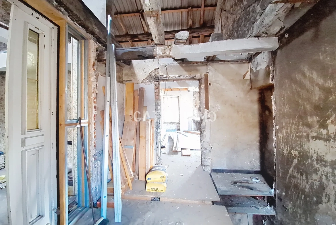 Maison à rénover de 136 m² au centre de Boulay - Potentiel d'investissement 