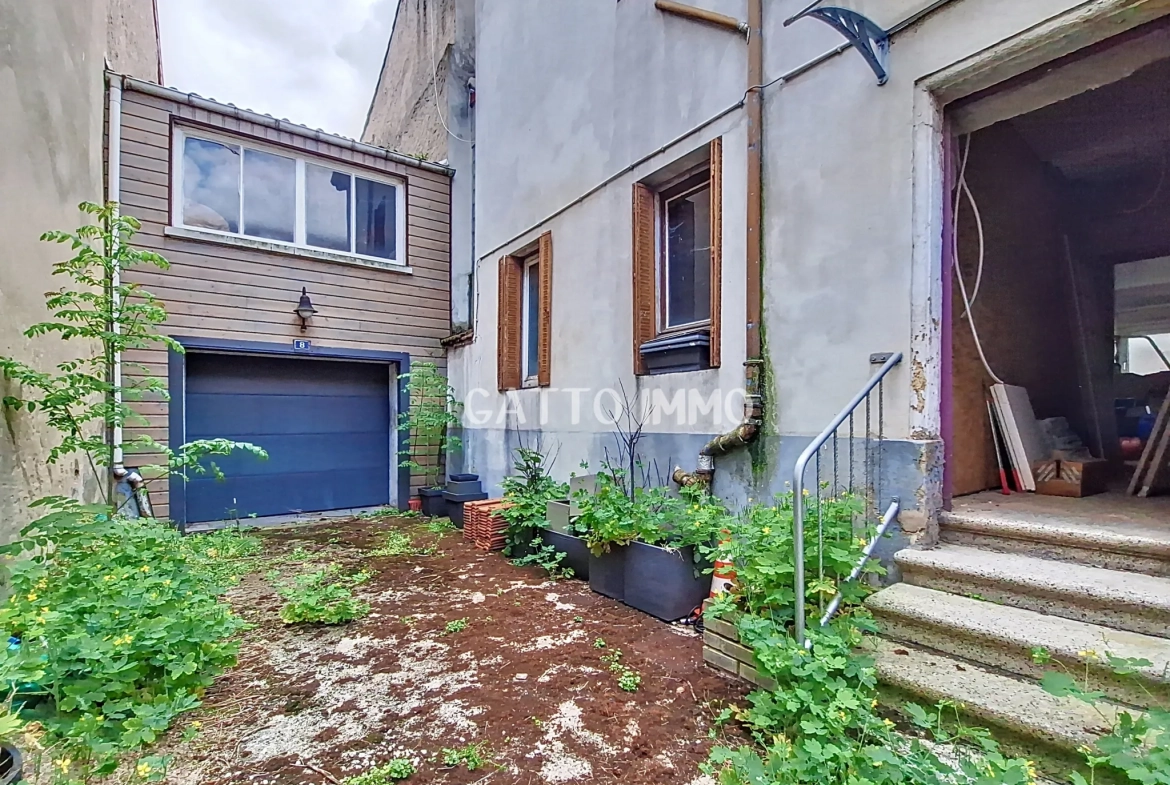 Maison à rénover de 136 m² au centre de Boulay - Potentiel d'investissement 