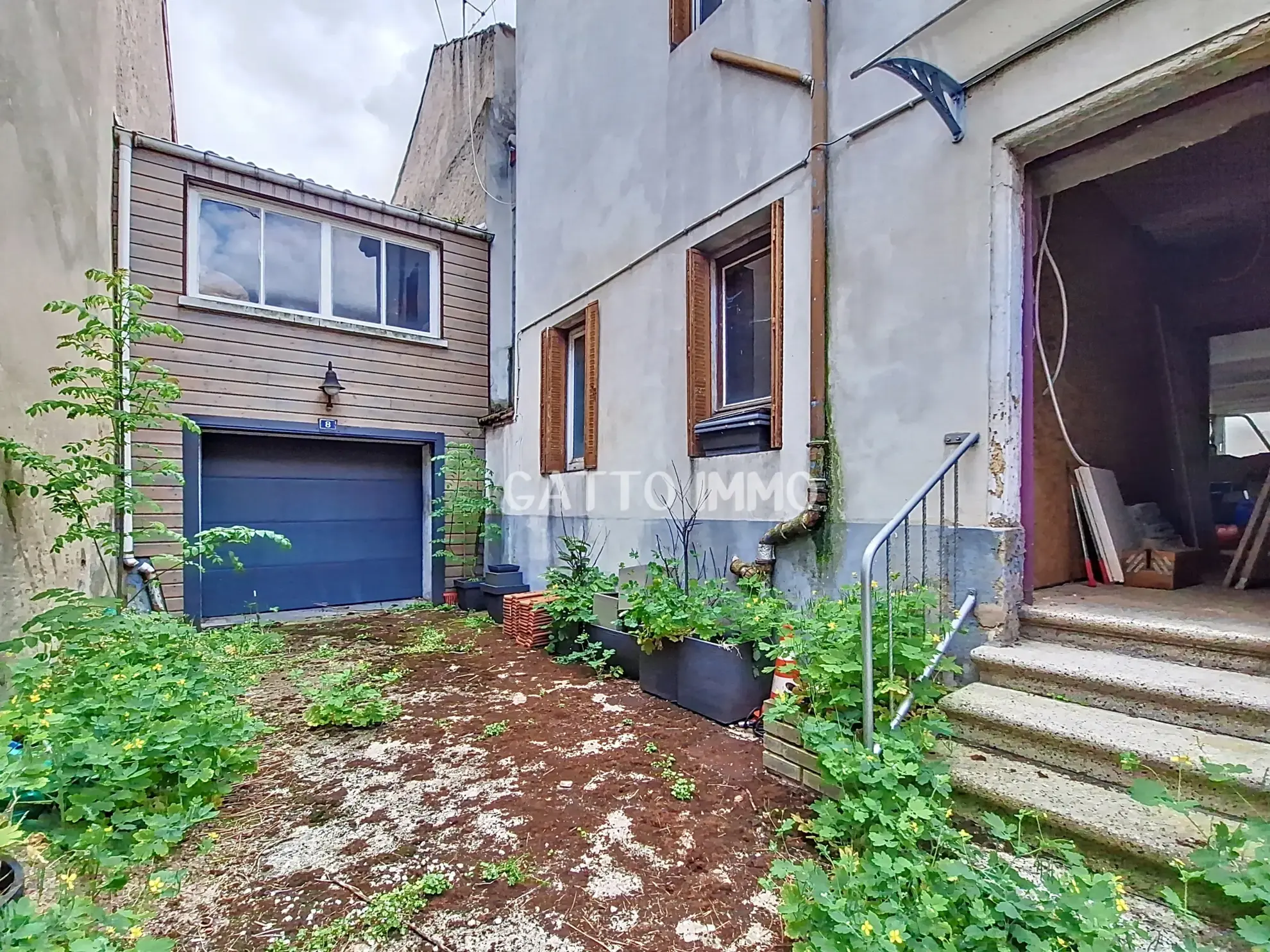 Maison à rénover de 136 m² au centre de Boulay - Potentiel d'investissement 