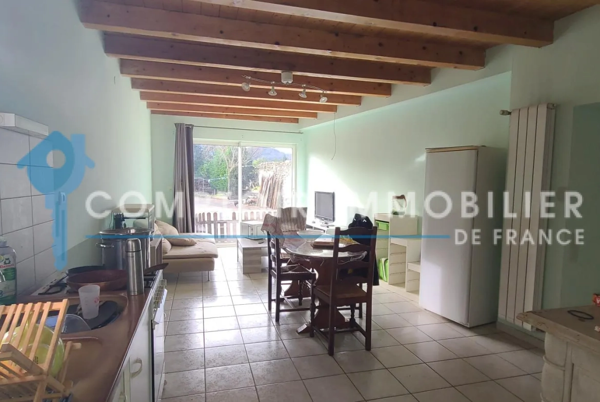 Maison T3 de 144 m² avec appartement T2, hangar et terrain à Montrejeau 