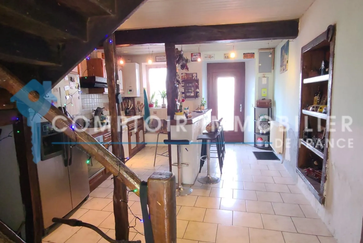Maison T3 de 144 m² avec appartement T2, hangar et terrain à Montrejeau 