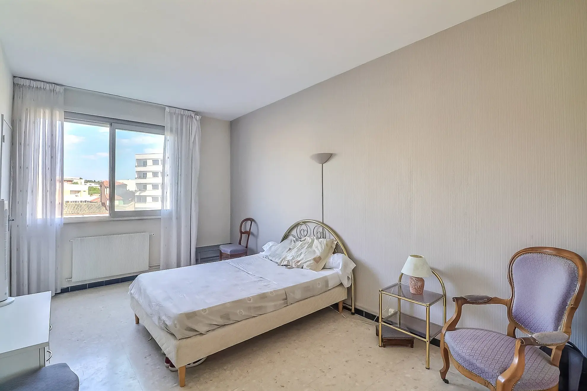 Appartement T4 lumineux de 93,80 m² à Nîmes avec balcon sud-est 