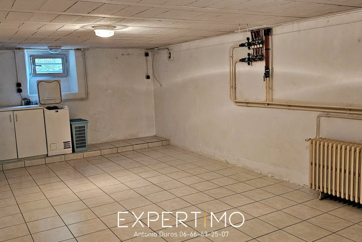 Maison à Loudéac 132 m² avec jardin et garage, proche commodités 