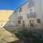 Maison T5 à VALROS avec cour et local commercial, à rénover