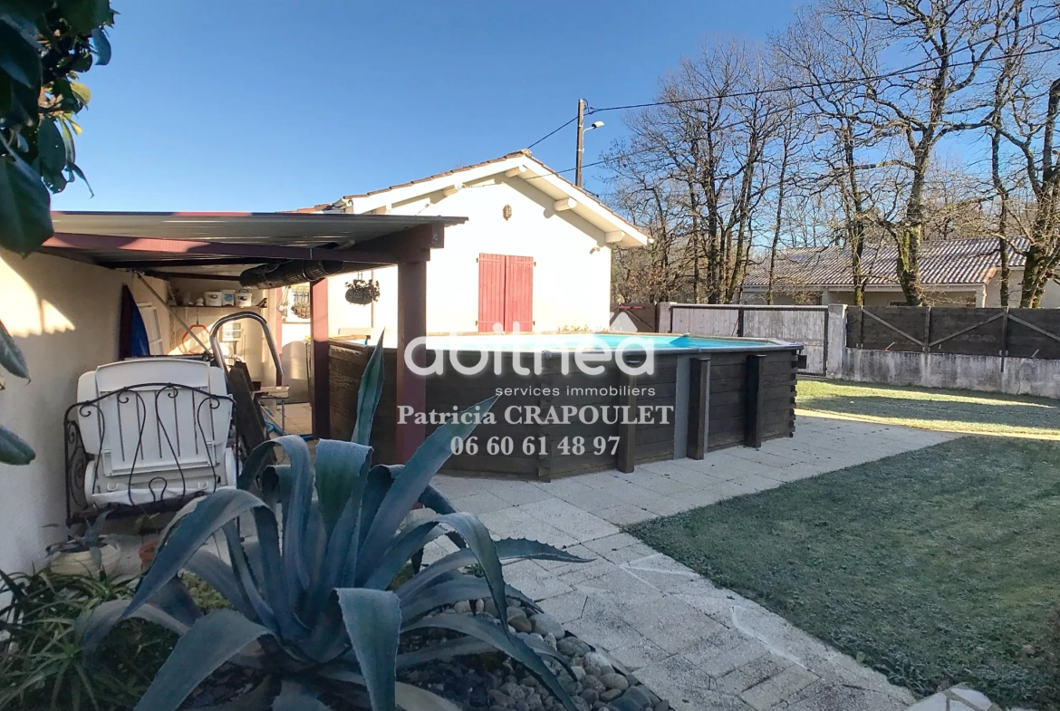 Maison de plain-pied avec piscine et 4 chambres à Puymoyen, idéalement située 