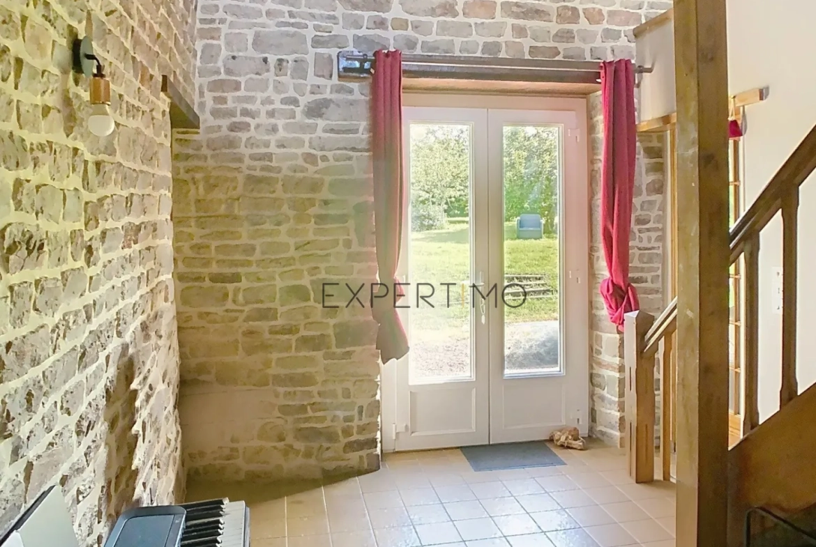 Maison en pierre de 130 m² avec dépendance et jardin clos proche d'Aunay-sur-Odon 