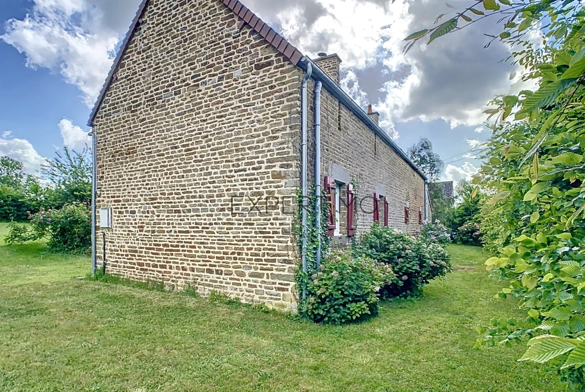 Maison en pierre de 130 m² avec dépendance et jardin clos proche d'Aunay-sur-Odon 