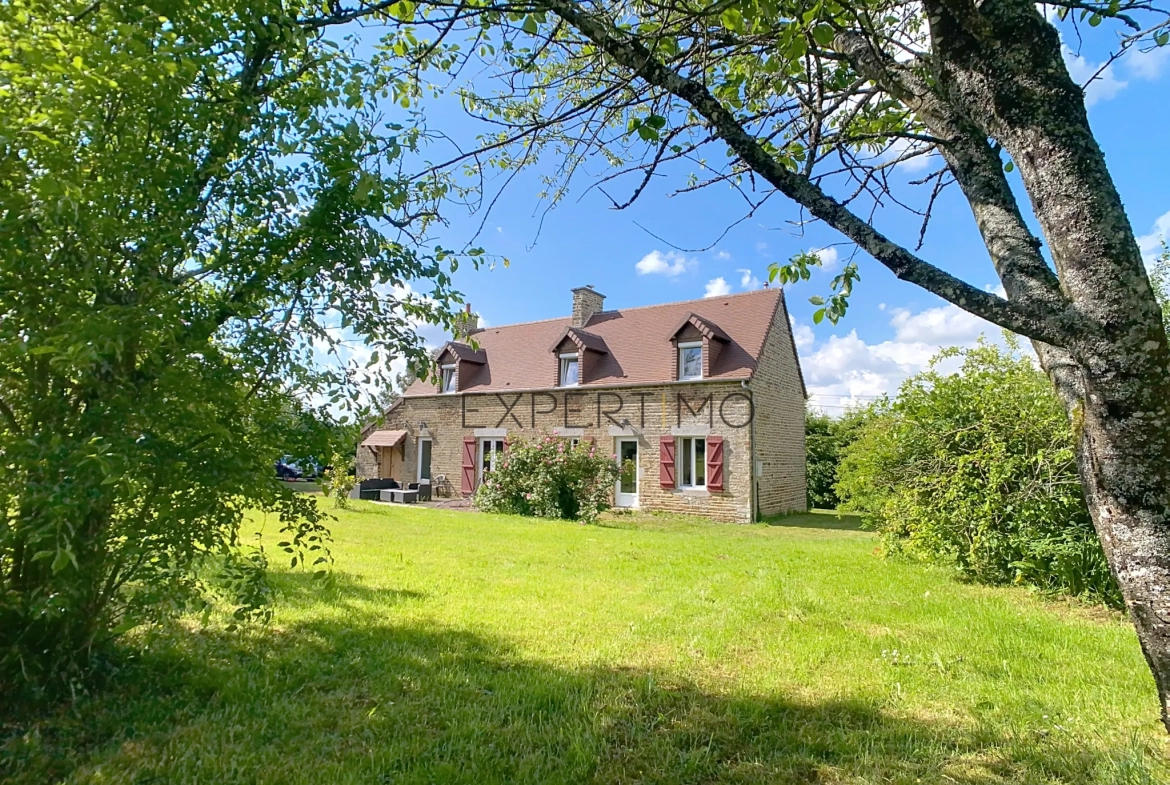 Maison en pierre de 130 m² avec dépendance et jardin clos proche d'Aunay-sur-Odon 