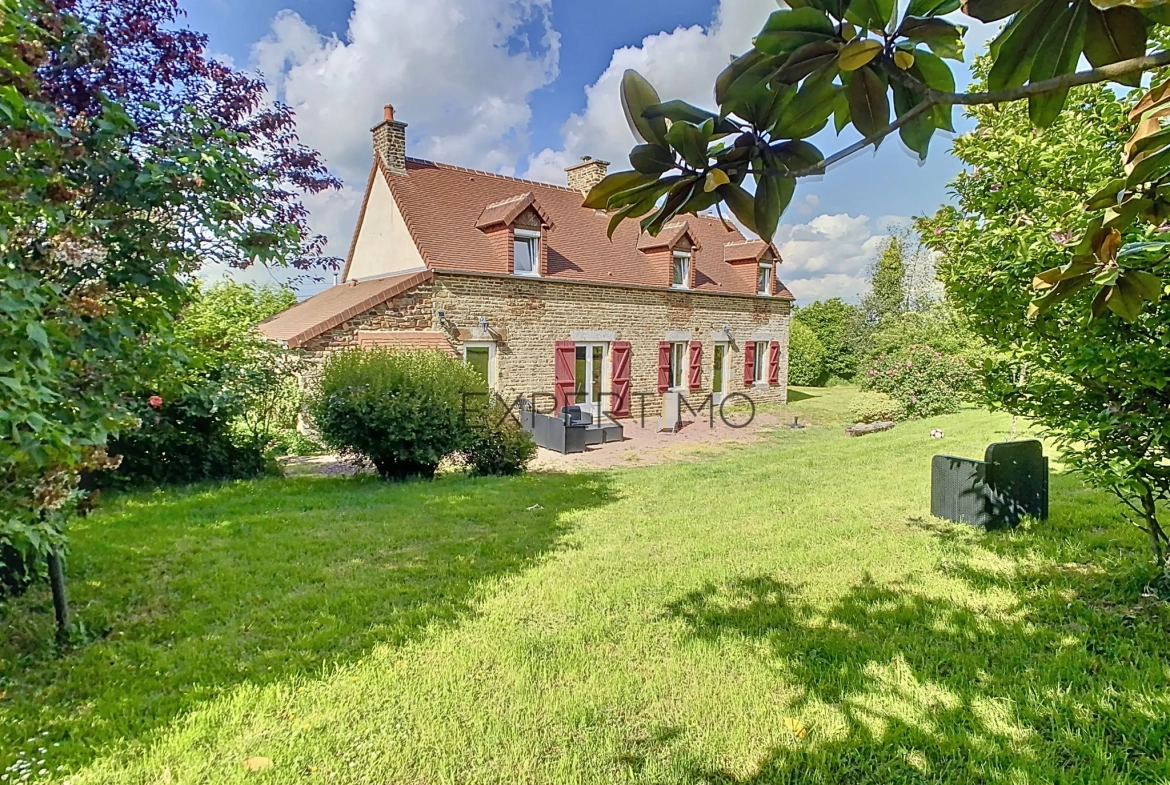 Maison en pierre de 130 m² avec dépendance et jardin clos proche d'Aunay-sur-Odon 