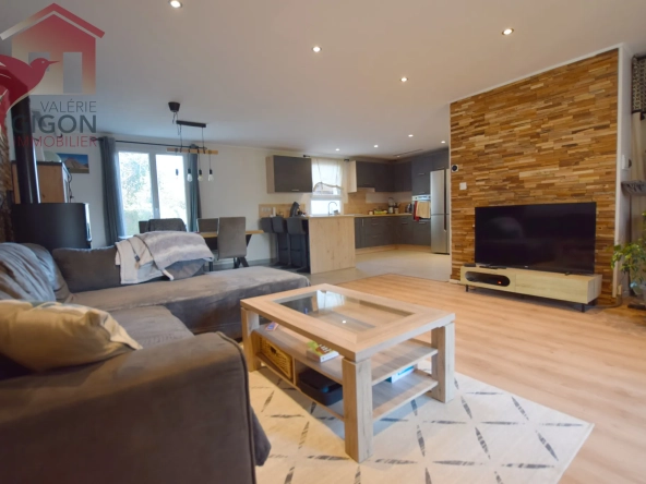 Maison contemporaine de plain-pied rénovée à Grand Charmont avec jardin clos
