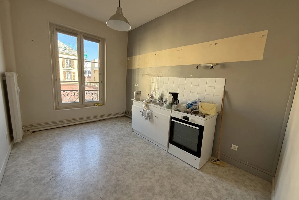 Appartement lumineux de 75 m² à Vichy dans résidence sécurisée avec charme ancien 