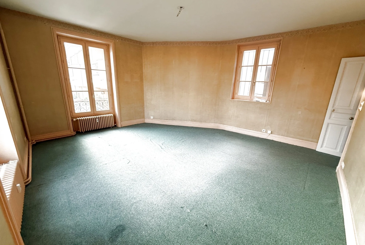 Appartement lumineux de 75 m² à Vichy dans résidence sécurisée avec charme ancien 