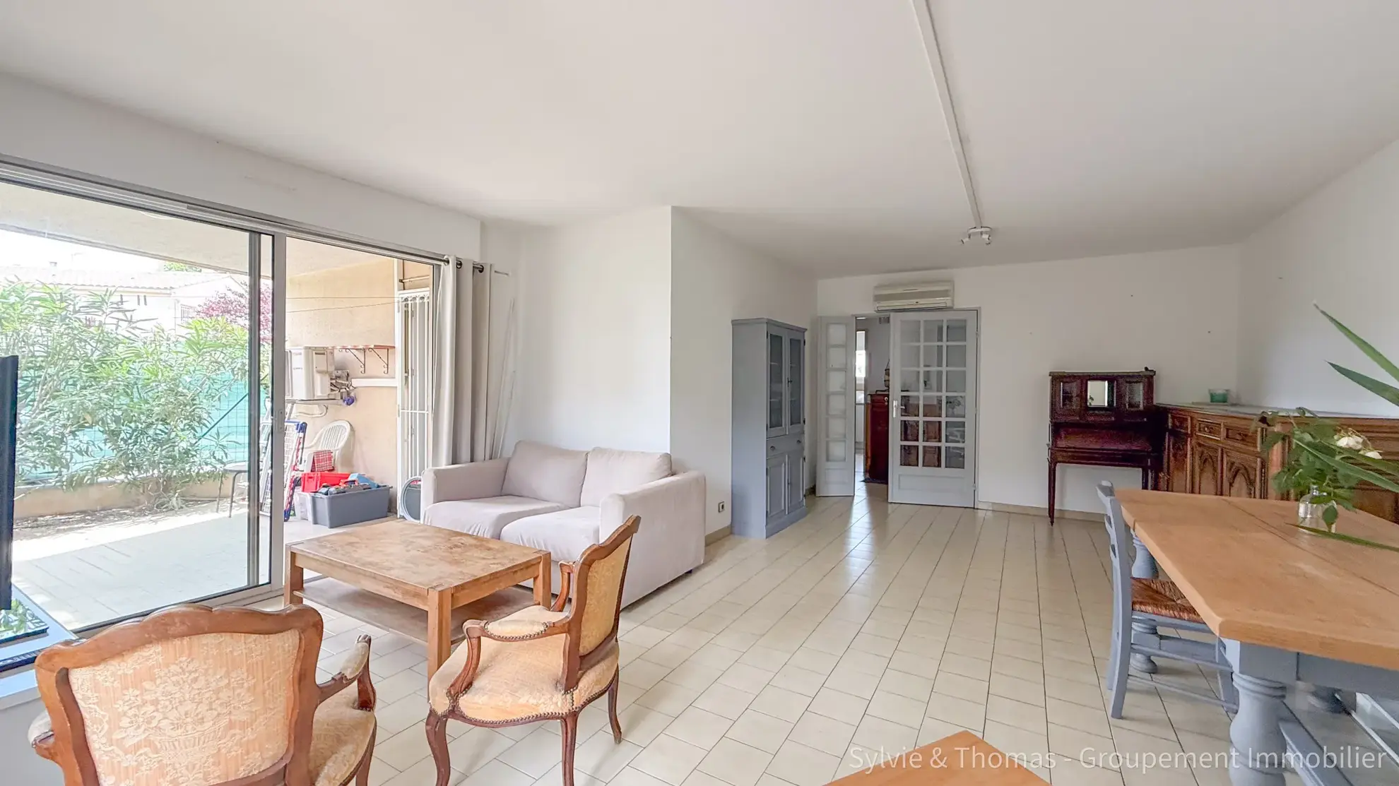 Appartement T3 en rez-de-jardin à Orange avec terrasse et jardin 