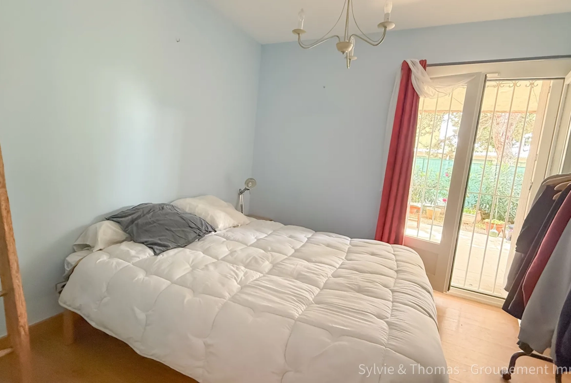 Appartement T3 en rez-de-jardin à Orange avec terrasse et jardin 