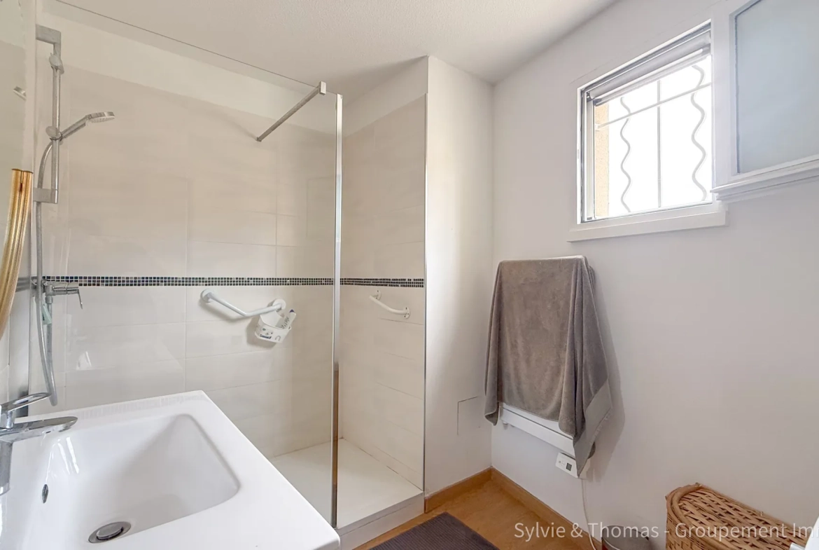 Appartement T3 en rez-de-jardin à Orange avec terrasse et jardin 