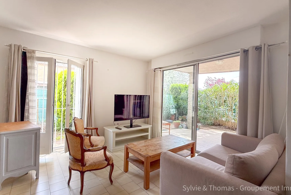 Appartement T3 en rez-de-jardin à Orange avec terrasse et jardin 