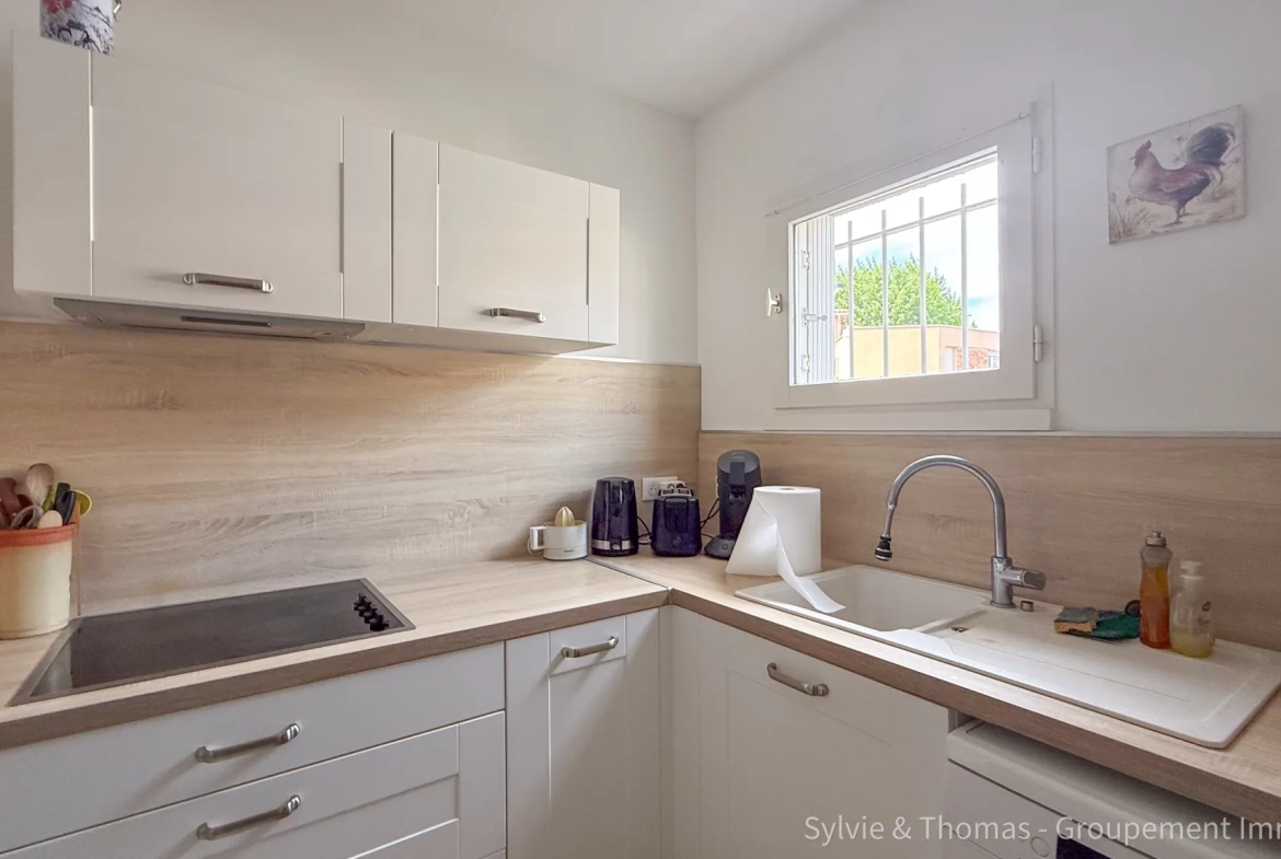 Appartement T3 en rez-de-jardin à Orange avec terrasse et jardin 