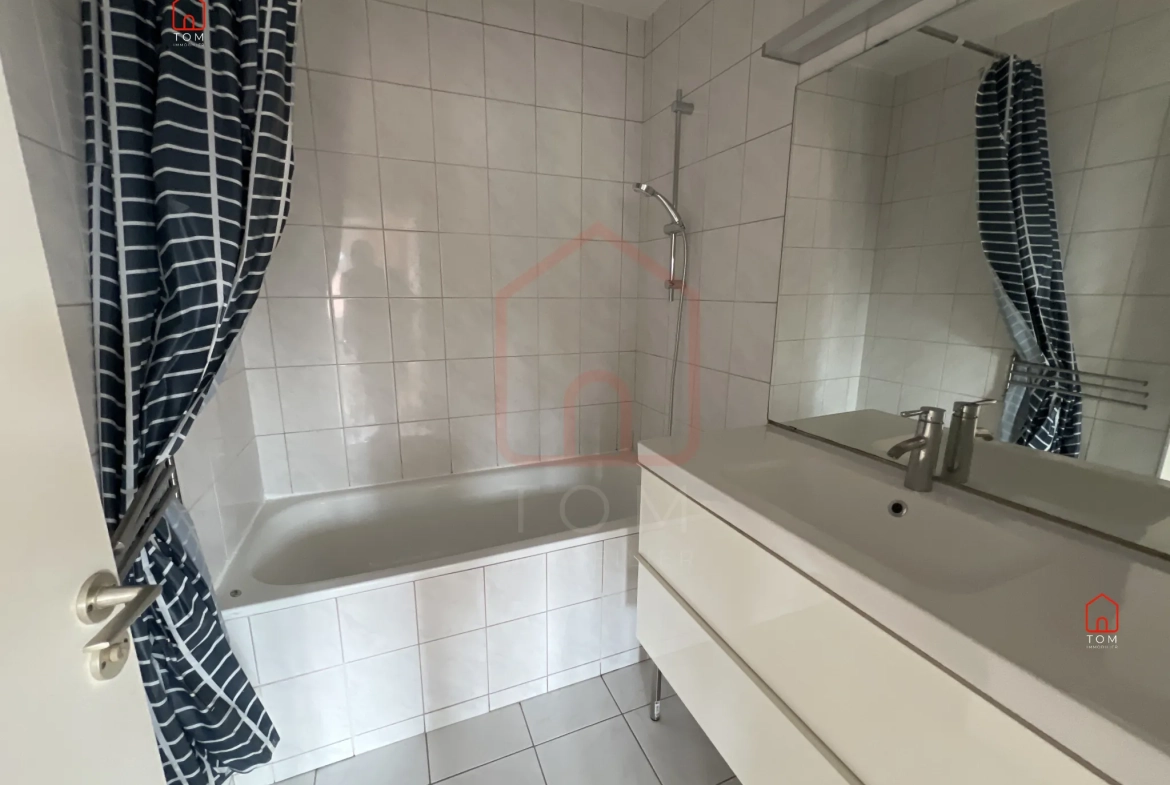 Vente d'un appartement 2 chambres à Mons-En-Baroeul - Résidence sécurisée 