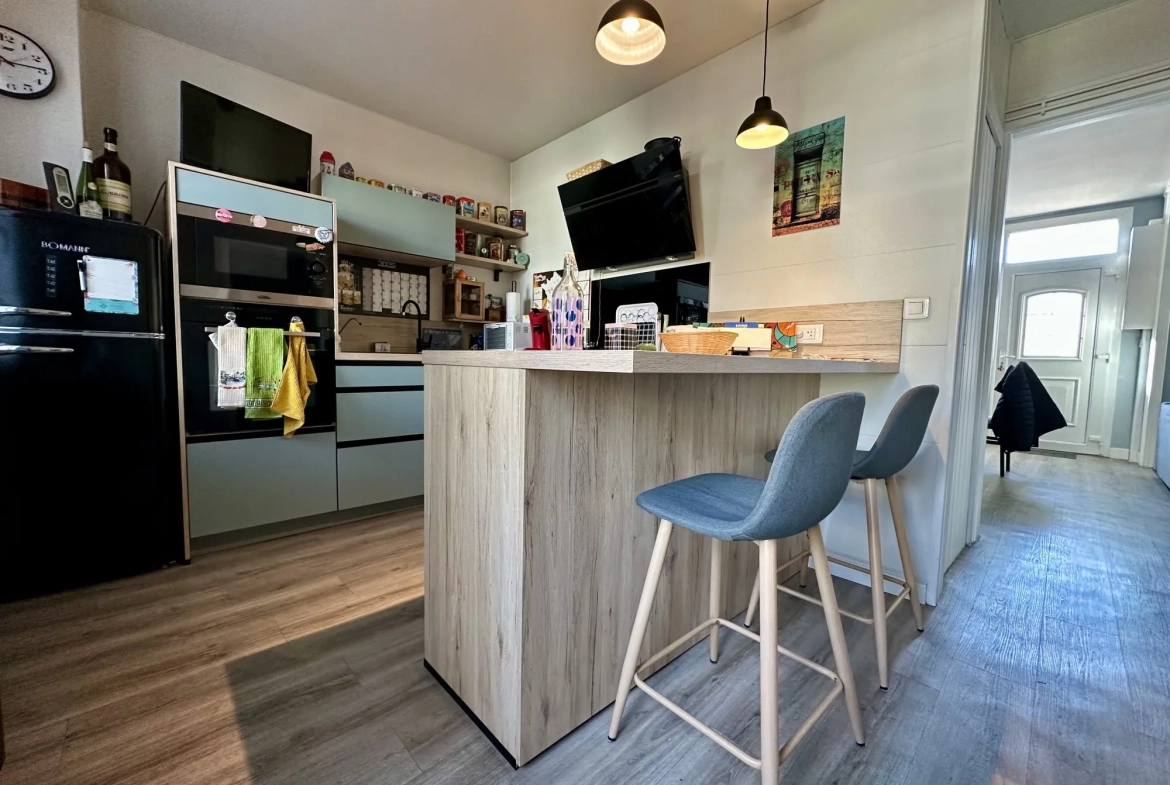 Maison spacieuse avec 3 chambres, garage et terrain clos à Saint-Aubin-lès-Elbeuf 